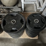 HAMMER STRENGTH ROUND RUBBER OLYMPIC PLATES Used Weights HAMMER STRENGTH ROUND RUBBER OLYMPIC PLATES Used Weights